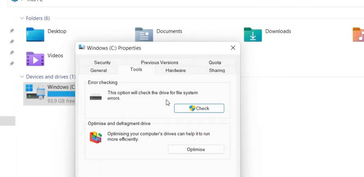 A screenshot of a Windows PC reveals the "Windows (C:) Properties" window. On the "Tools" tab, options for error checking and optimizing the drive are visible, offering potential solutions to retrieve deleted images. The desktop background features folders like Desktop, Documents, and Downloads.